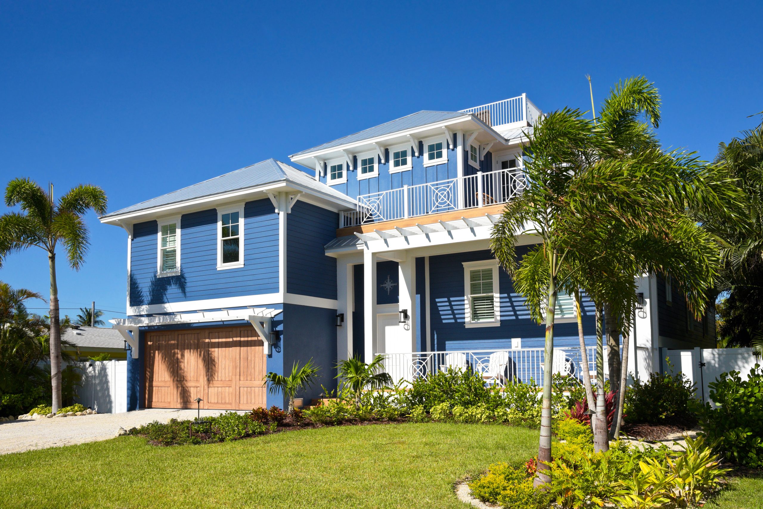 Beautiful New Florida House with Palms Trees and Landscaping